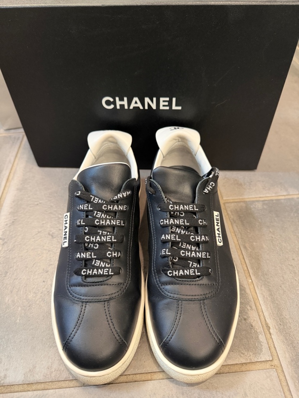 CHANEL Black and White Leather Low-Top Sneakers